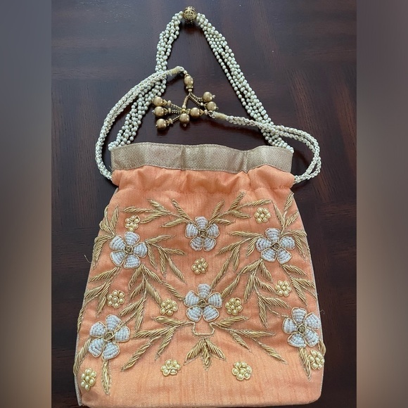 Women’s Luxuries Pearl &glass beads embellished potli bags in peach color - Picture 3 of 7